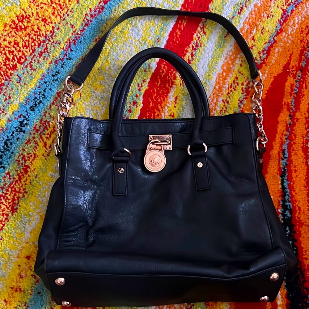 Michael Kors black leather and rose gold accents hardware
